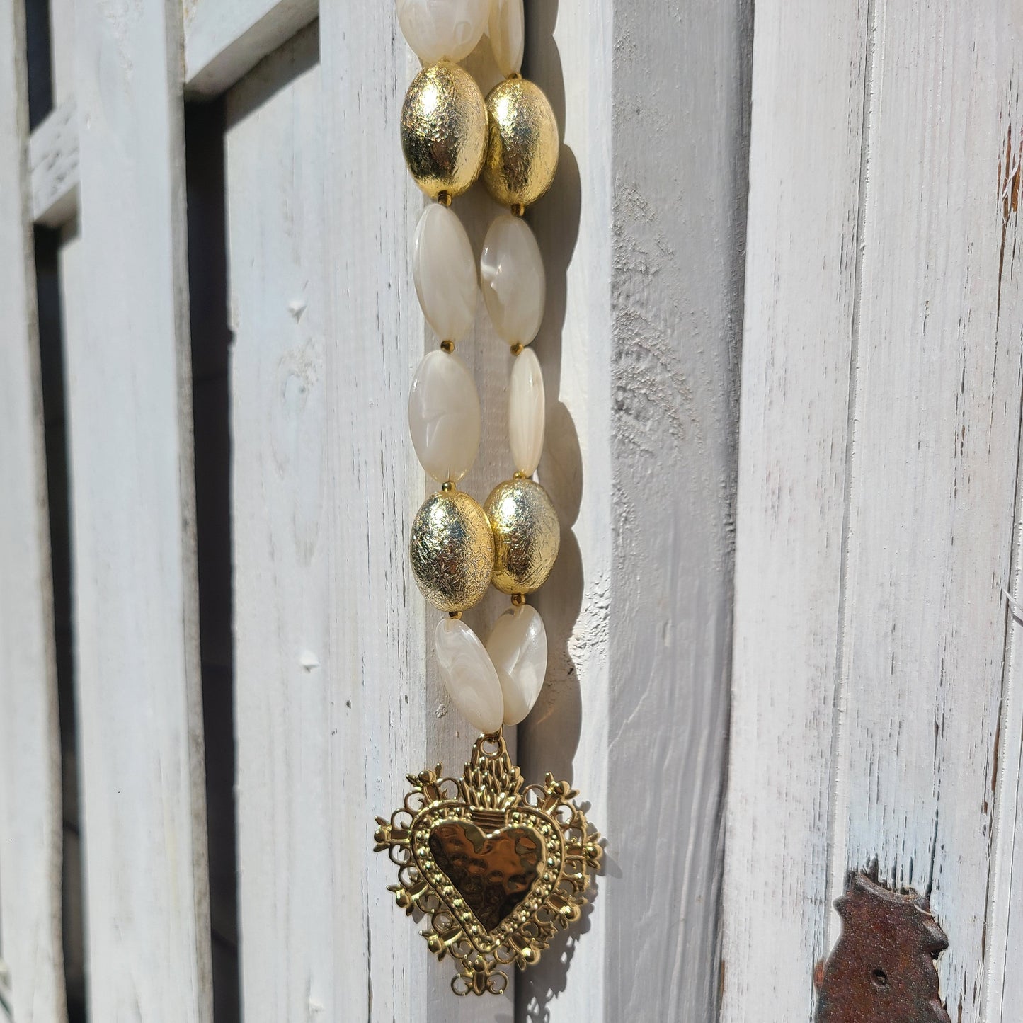 Collier perle et cœur